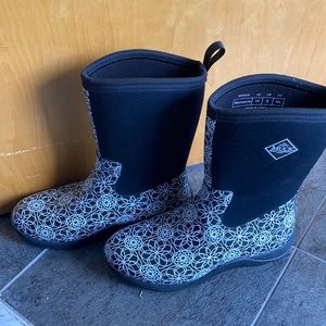 Muck boots black and white pattern. Rain boots